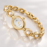 Perla - reloj dorado con detalles perlados