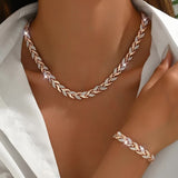Elara - conjunto de collar y pulsera con hojas entrelazadas