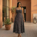 Arena - vestido midi con lazo en la espalda