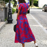 Lucía Fucsia - vestido cruzado con estampado