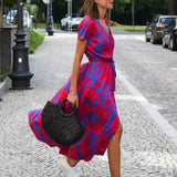 Lucía Fucsia - vestido cruzado con estampado