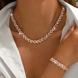 Elara - conjunto de collar y pulsera con hojas entrelazadas